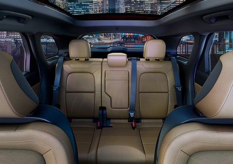The spaciousness of the second row of the 2023 Lincoln Corsair® SUV is shown. | Eby Lincoln in Goshen IN