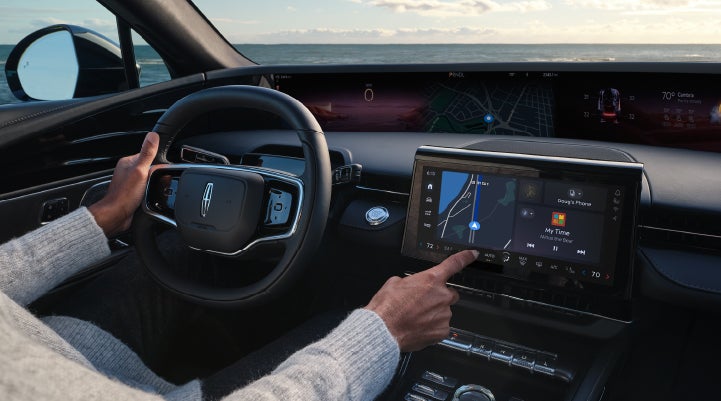 The driver of a 2024 Lincoln Nautilus® SUV interacts with the new Lincoln Digital Experience. | Eby Lincoln in Goshen IN