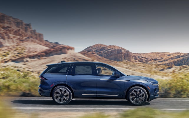 A 2024 Lincoln Nautilus® SUV is being driven in a desert setting. | Eby Lincoln in Goshen IN